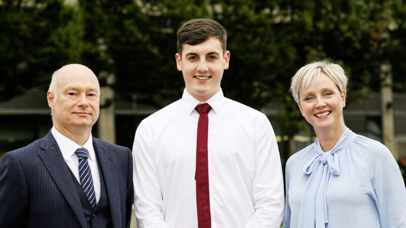 Announcing the UU-PwC partnership are (from left) Professor Paul Bartholomew (UU deputy vice-chancellor at Ulster University), Philip Black (placement student with PwC, studying business economics at UU) and Lynne Rainey (PwC deals partner and student recruitment lead) 
