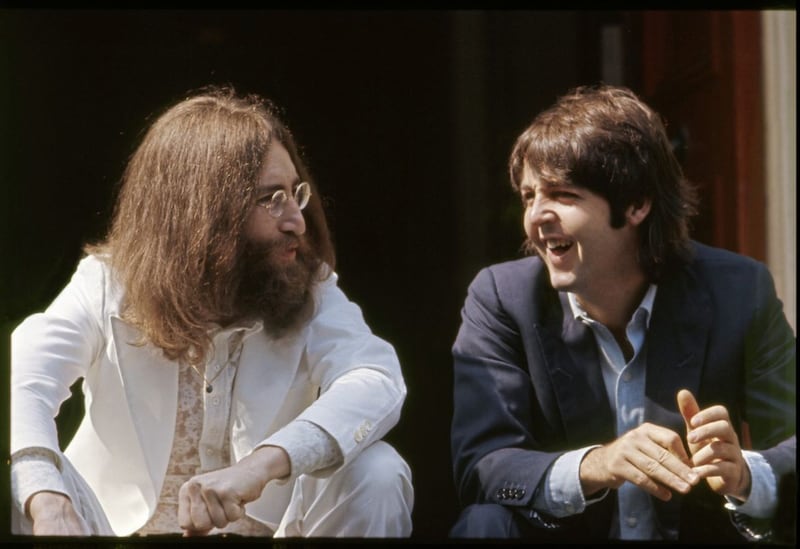 Paul with John Lennon during the Abbey Road cover shoot. Abbey Road Studios, London, 1969. &copy; Paul McCartney / Photographer: Linda McCartney 