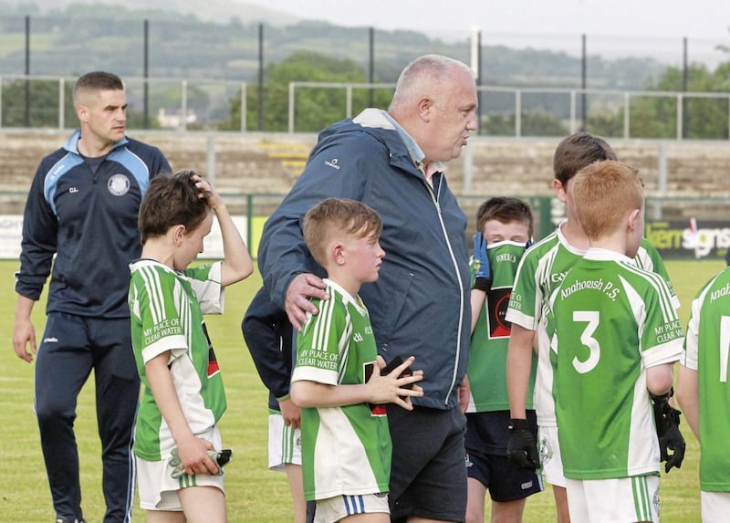 Danny Quinn encourages his young team from Anahorish Primary School after a narrow loss during the Cumann na mBunscol Derry boys football finals at Owenbeg. Picture by Margaret McLaughlin 