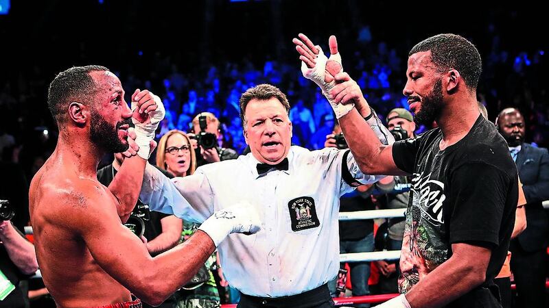ALL SQUARE: James DeGale and Badou Jack react after the result of their super middleweight title boxing bout was announced on Saturday night in New York. The bout ended in a majority draw