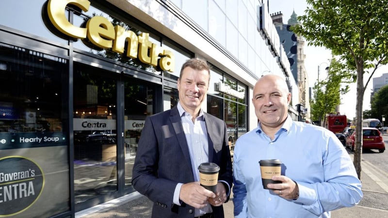 Nigel Maxwell, Centra Northern Ireland sales director, and store owner Donagh McGoveran outside the new Centra store on High Street in Belfast                                     