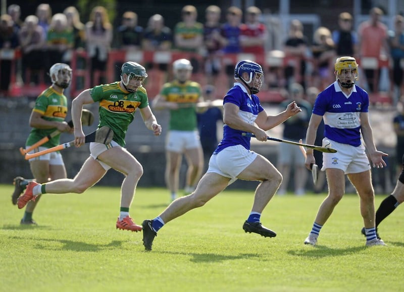 Darragh McGuinness of St John&#39;s breaks away from the attention of Dunloy&rsquo;s Conal Cunning Picture: Mark Marlow 