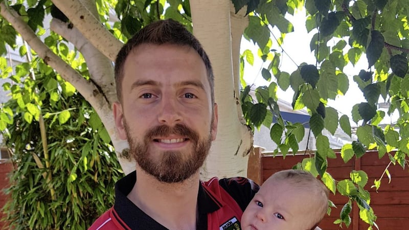 Former Down minor D&oacute;nal Kearney and baby son Tadhg will be cheering on the Mournemen against Donegal on Sunday 