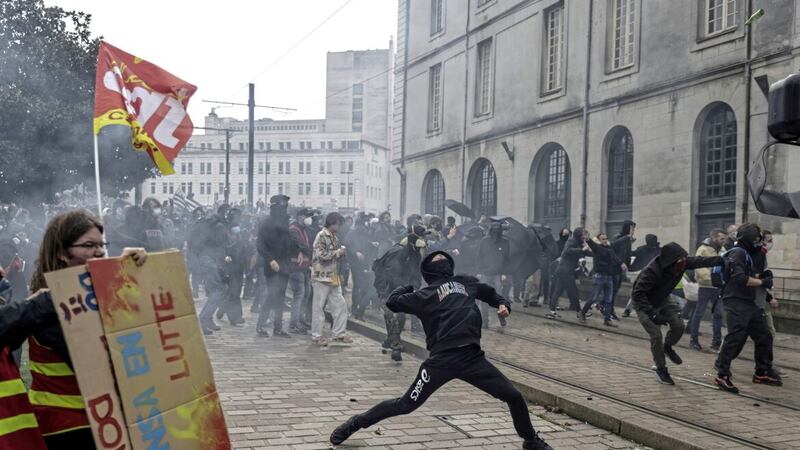 A protester confronts riot police during a rally in Nantes. The French appear to be tearing their country apart over President Macron&rsquo;s unilateral decision to increase the pension age from 62 to 64 