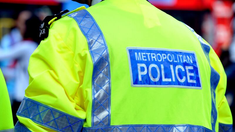 The Metropolitan Police said the two men were accused of an offence under the Official Secrets Act
