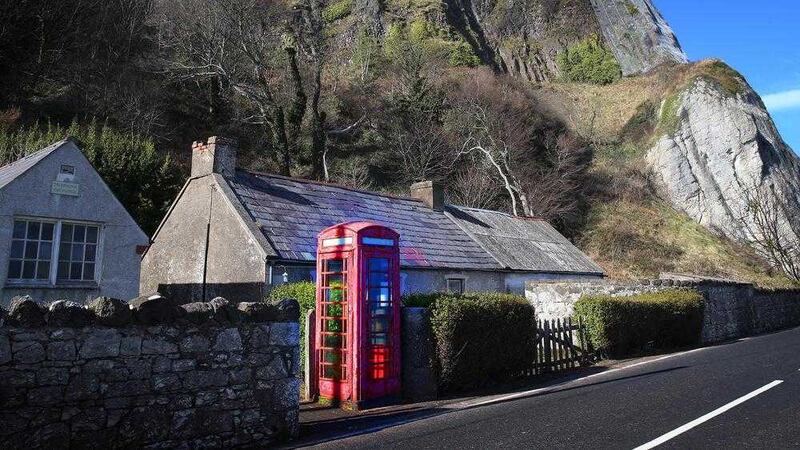 No calls were made at 125 boxes across the north in the last 12 months. Pictured is a red phone box in Carnlough, Co Antrim. Picture by Hugh Russell 