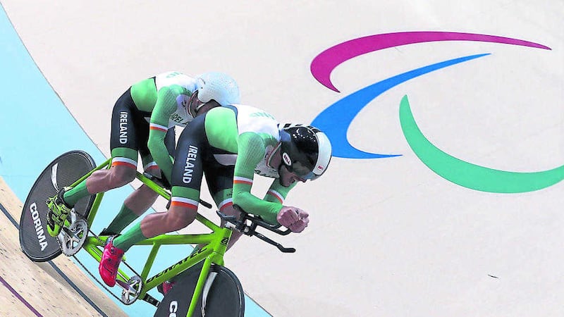Ireland's Sean Hahessy (pilot) and Damien Verecker in action during the cycling track men's B 4,000m individual pursuit qualifying at the Rio Olympic Velodrome on Thursday<br />Picture by PA