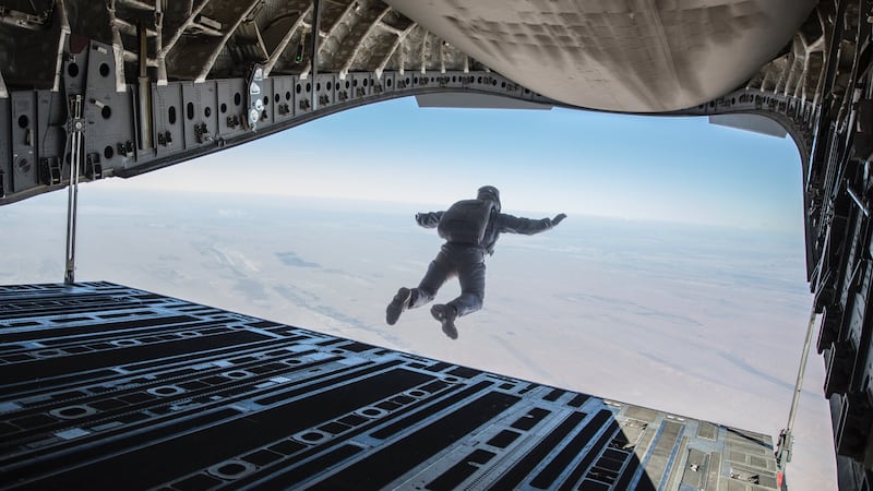 A photograph of Tom Cruise performing the Halo jump in Mission: Impossible Fallout by unit stills photographer Chiabella James