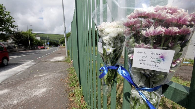 Flowers left at the scene on the Whiterock Road, Belfast 