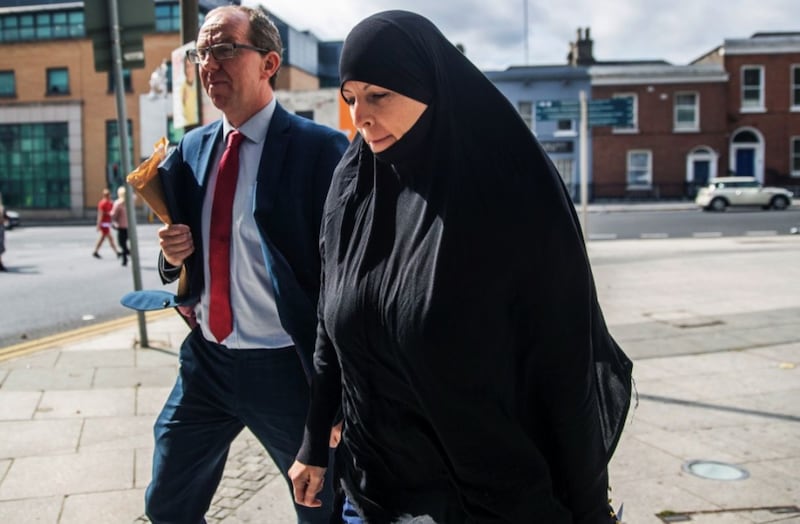 Alleged IS member Lisa Smith leaving Dublin District Court with her solicitor Peter Corrigan following an earlier hearing. Picture by Brian Lawless, Press Association