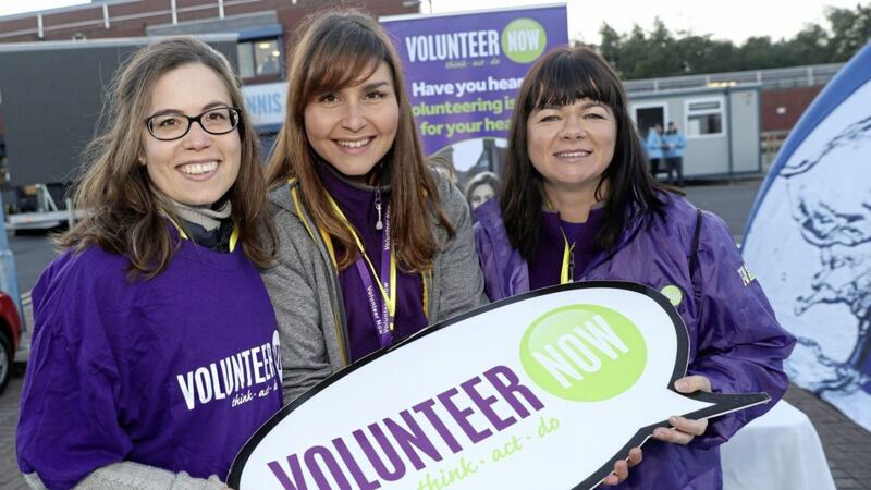 Members of Volunteer Now at last year&#39;s Belfast City Marathon, from left, Christina Quevedo, Raquel Rodrigues-Keenan and Lindsay Armstrong. Picture by Press Eye 
