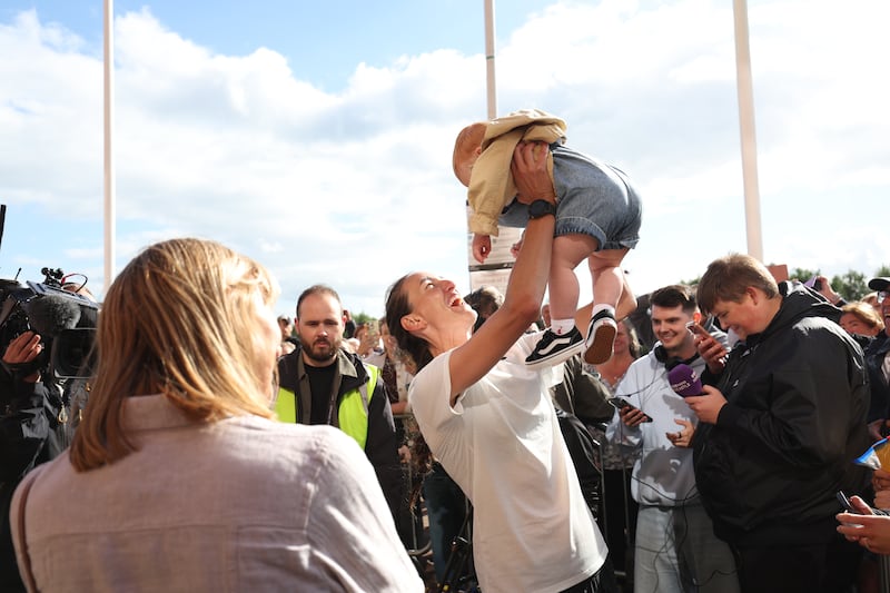 Former Lioness Jill Scott hugs her nephew as she arrives at the Stadium of Light in Sunderland