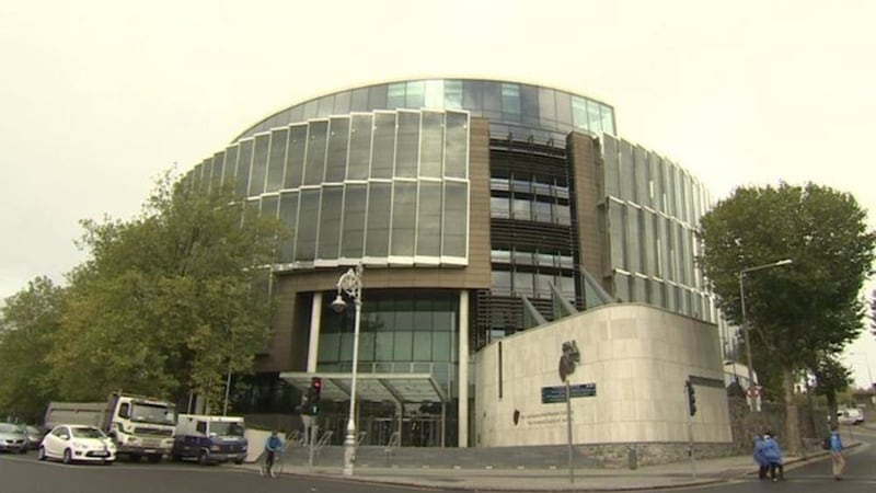 Three people with Belfast addresses were among four men and a woman due to appear before the Special Criminal Court in Dublin last night 