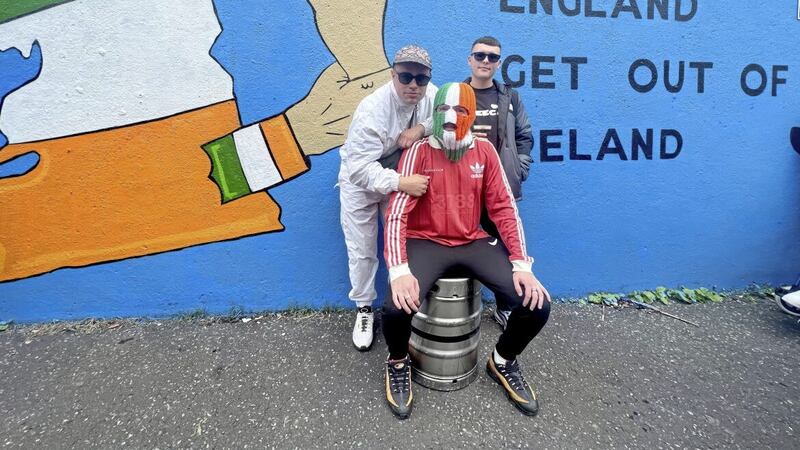 West Belfast rap group Kneecap perform in the Irish language 