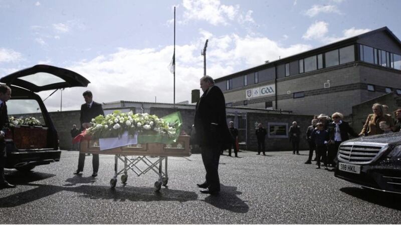 The funeral cortege of John Murphy stopped at P&aacute;irc Esler GAA stadium in Newry. Picture by Hugh Russell 