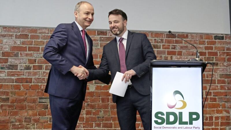 Fianna F&aacute;il leader Miche&aacute;l Martin and SDLP leader Colum Eastwood at a press conference last month in Belfast. Picture by Niall Carson/PA Wire 