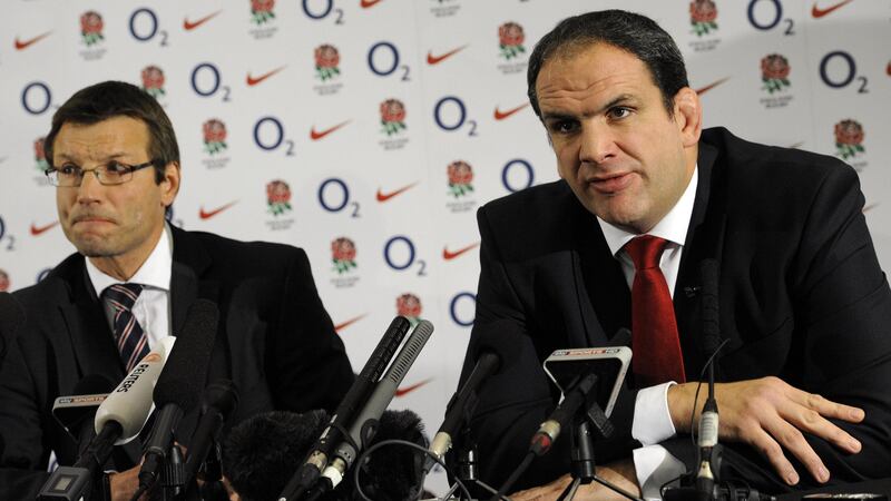 Martin Johnson (right) announced his resignation as England rugby union team manager on this day in 2011 (Rebecca Naden/PA)