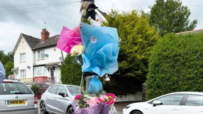 Flowers and tributes left for the two teenagers in Ely, Cardiff, whose deaths in a crash sparked a riot (PA)