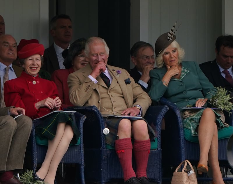 The Princess Royal, the King and the Queen during the Braemar Gathering in September