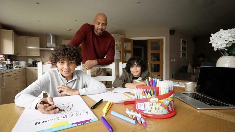 Q Radio presenter and Children in Northern Ireland ambassador, Ibe Sesay, is joined by his sons, Stephen (11) and Daniel (10), to launch Letters of Lockdown 