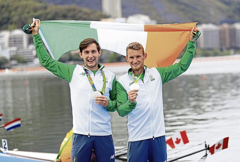 Ireland's Gary (right) and Paul O'Donovan celebrate winning silver in the Lightweight Men's Double Sculls final at The Lagoa Stadium on the seventh day of the Rio Olympic Games<br />Picture by AP