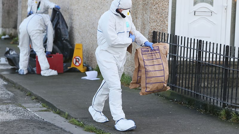 &nbsp;Forensic officers at the scene of the gun attack. Picture by Brian Lawless/Press Association.
