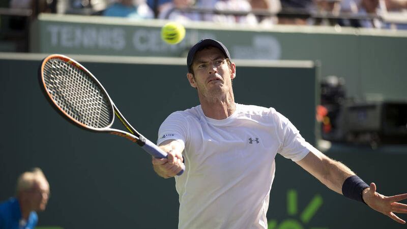 Andy Murray, of Great Britain, returns the ball to Kevin Anderson, of South Africa, during their match at the Miami Open tennis tournament in Key Biscayne, Fla., Tuesday, March 31, 2015. (AP Photo/J Pat Carter). 