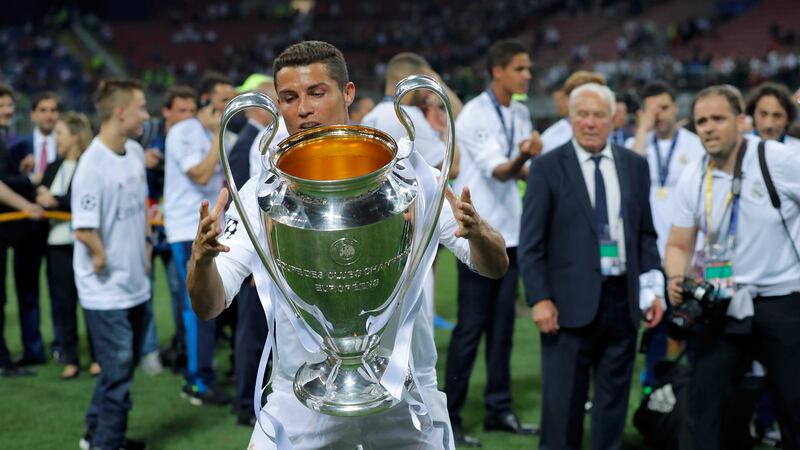 Cristiano Ronaldo with the European Cup after Real Madrid beat neighbours Atletico in Saturday's final at the San Siro <br />Picture by AP&nbsp;