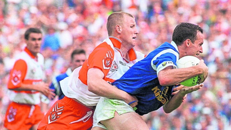 Johnny McBride pursues Damien O’Reilly of Cavan during the 1997 Ulster Senior Championship final at St Tiernach’s Park, Clones. Derry lost the game by a point. While they returned to the scene the following year to take the Anglo-Celt with a two-point victory over Donegal, McBride’s lack of involvement makes it hard for him to value the medal he won as part of the Oak Leaf panel. Picture: Sportsfile