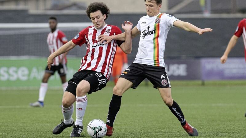 Derry City&#39;s Barry McNamee tussles for possession with Keith Buckley of Bohemians at the Brandywell on Monday April 29 2019. Picture by Margaret McLaughlin 