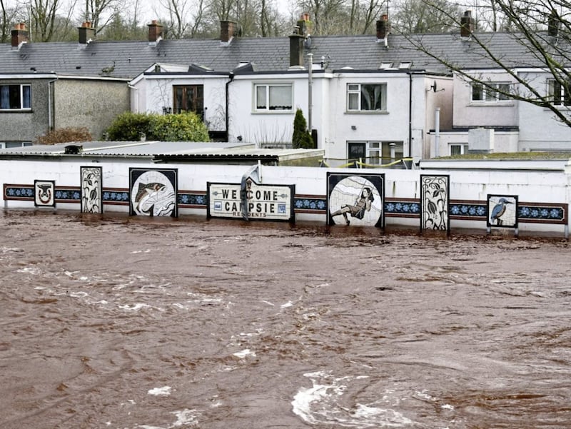 Alan Lewis- PhotopressBelfast.co.uk        9-2-2020.A wall holds back a massive flood at Campsie in Omagh centre as Storm Ciara caused serious flooding across Northern Ireland with  County Tyrone amongst the worst affected areas..Several rivers converge around the town and large areas near the confluences were under water as rivers burst their banks..A public park and ride car park at Crevenagh Road was under water with motorists being summoned to collect their cars with the water levels rising... 