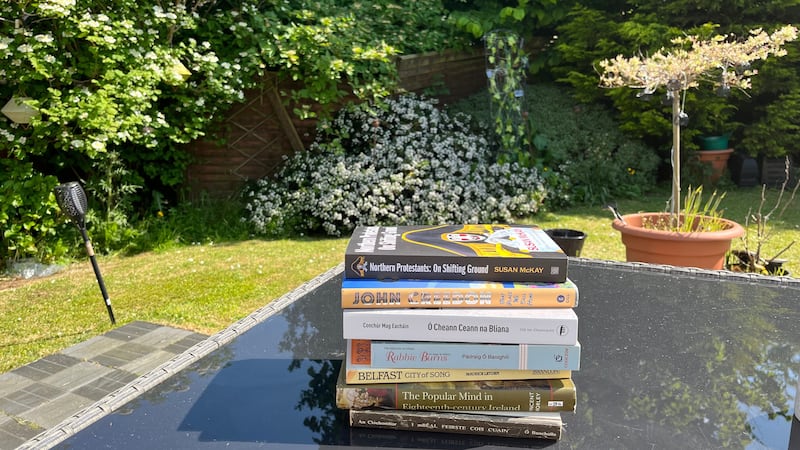 SUNNY DAY BOOKS: The Bluffer has been enjoying the fine weather by sitting in his garden reading a selection of books that has educated and entertained him while he gets a suntan that would make Rylan look like Casper