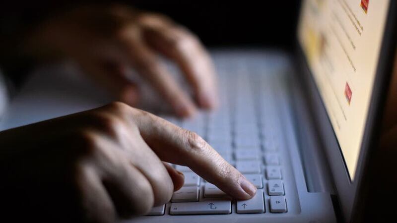 A woman using a laptop (Dominic Lipinski/PA)