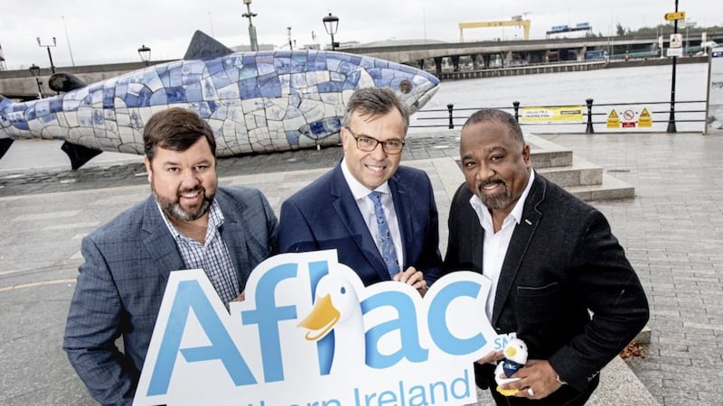 L-R: Keith Farley, managing director of Aflac Northern Ireland, Alastair Hamilton, chief executive, Invest NI and Virgil Miller, chief operating officer of Aflac US 