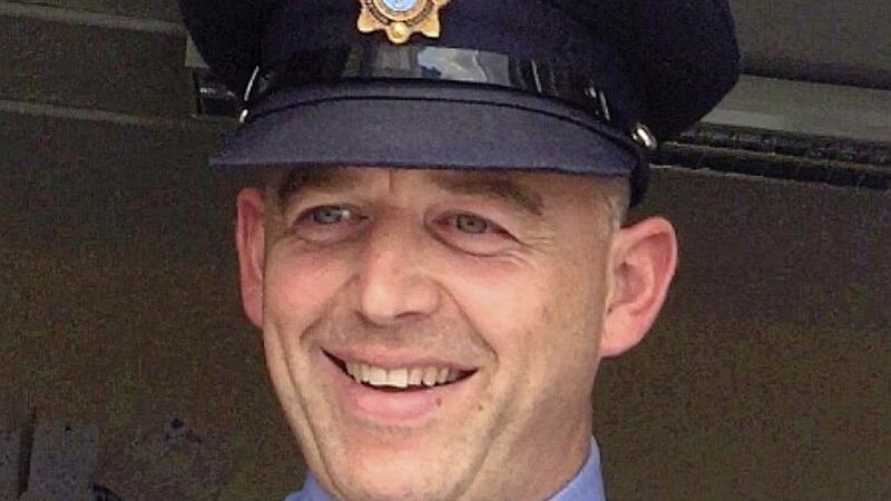The off-duty Garda, who died in a weekend diving accident has been named locally as father-of-four Dave Hearne 