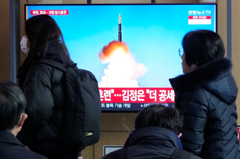 A TV screen shows an image of North Korea’s missile launch during a news programme at the Seoul Railway Station in Seoul, South Korea (Ahn Young-joon/AP)
