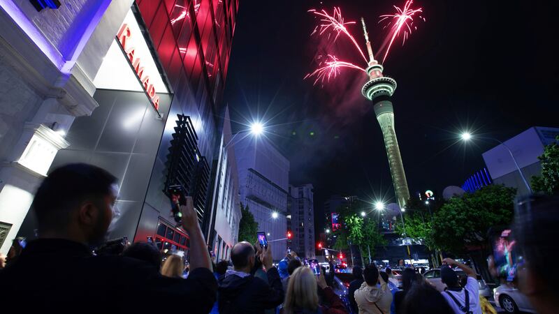 Sydney and Auckland have become the world’s first major cities to ring in 2024, with huge crowds of revellers cheering spectacular firework displays that lit up the skies over Sydney Harbour and New Zealand’s tallest structure, Sky Tower (Dan Himbrechts/AAP Image/AP)