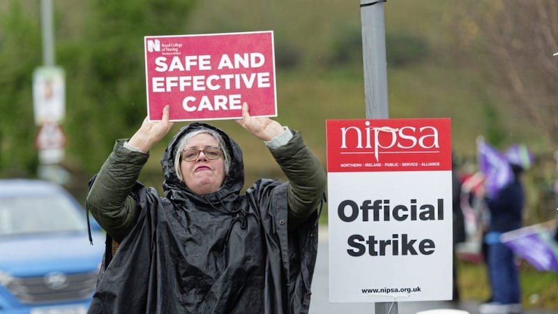 A supporter makes her voice heard at the official picket line at the South West Acute Hospital in Enniskillen. Picture by Ronan McGrade 