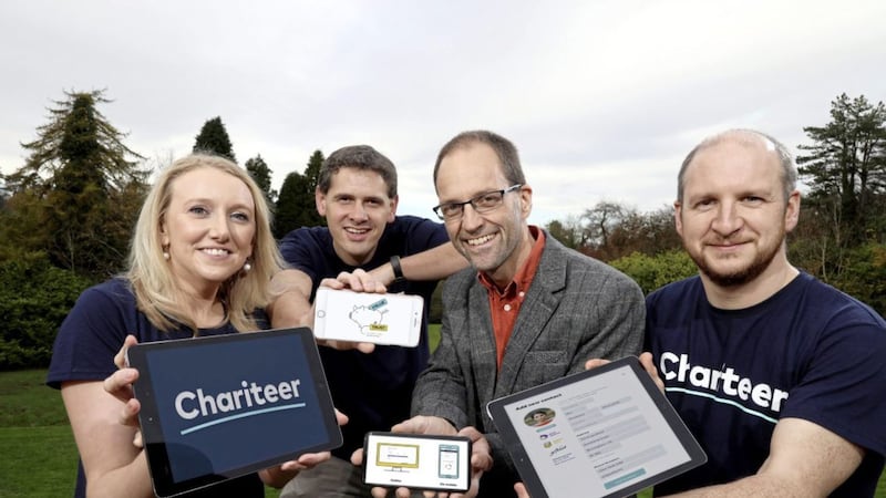Launching the new Chariteer platform for charities are (from left) Emma Kerr, marketing director of the company, Andrew Cuthbert, technical director of GCD Technologies, David Hall, international operations manager of the charity Fields of Life, and Andrew Gough, managing director of GCD Technologies 