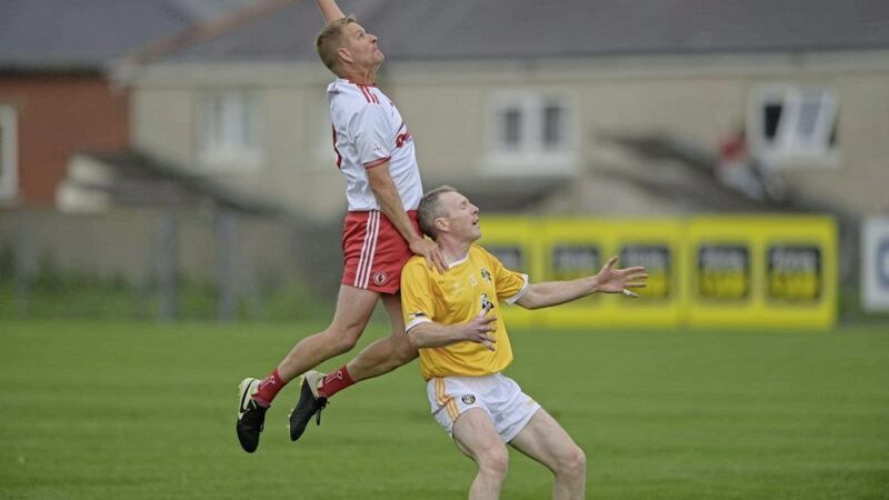 Mark Gallagher had a good tussle with Antrim&#39;s Kevin Brady as Tyrone saw off the Saffrons, a journey that has led the Red Hands to an All-Ireland final tomorrow. Picture by Bert Trowlen 