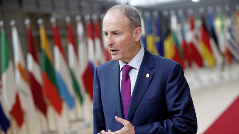 Miche&aacute;l Martin said he was &#39;very, very concerned&#39; about the level of Covid-19 cases north of the border. Picture by AP Photo/Francisco Seco 