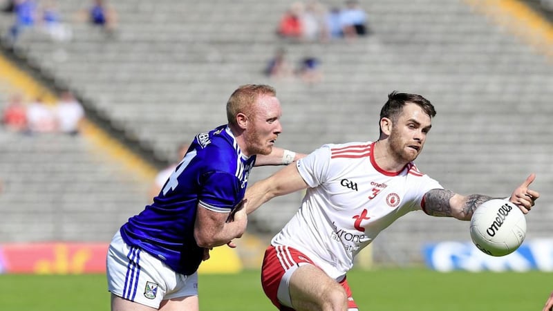 Tyrone&#39;s Ronan McNamee and Cavan&#39;s Cian Mackey in action during Saturday&#39;s All-Ireland Qualifier in Clones Picture by Philip Walsh. 