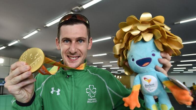 Michael McKillop of Team Ireland celebrates with his gold medal after winning the Men&#39;s 1500m T37 Final at the Olympic Stadium during the Rio 2016 Paralympic Games. Picture by Paul Mohan, Sportsfile 