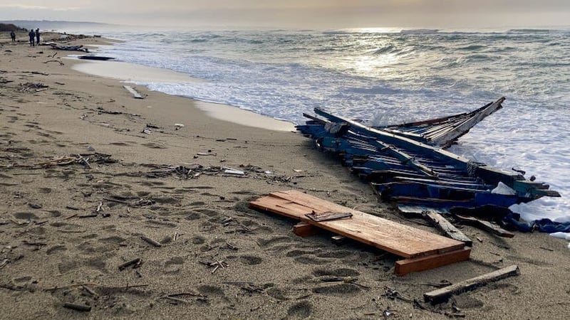 Part of the wreckage of the capsized boat washed ashore at a beach near Cutro (Paolo Santalucia/AP)