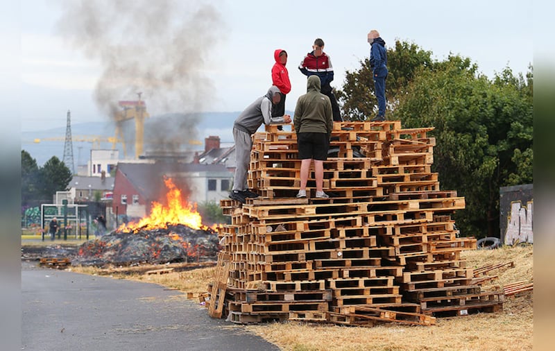 &nbsp;Bonfire builders on Bloomfield Walkway in east Belfast. Picture by Mal McCann