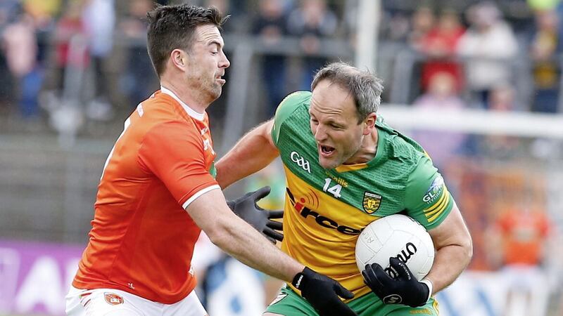 Armagh&#39;s Aidan Forker and Michael Murphy in action during the Qualifier between Armagh and Donegal at Clones. Pic Philip Walsh. 