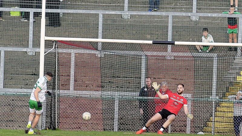 Donal O&#39;Hare slots home a penalty for Burren yesterday - the first of two second half goals that helped the St Mary&#39;s to the Down title. Picture by Philip Walsh 