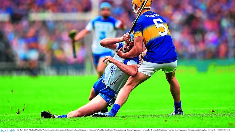 Waterford's Michael Walsh tries without success to get past Tipperary's Ronan Maher during Sunday's Munster Hurling final at Semple Stadium<br />Picture: Sportsfile