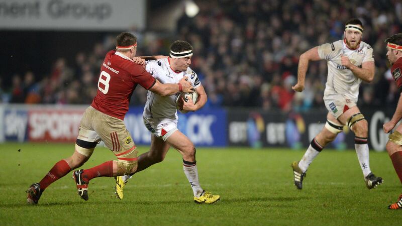 Ulster's Rob Herring shrugs off Munster's CJ Stander during the Pro12 clash at Kingspan Stadium, Belfast. Picture by Mark Marlow
