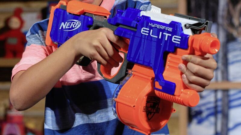 A child playing with a Nerf N-Strike Elite Hyperfire. Experts from the UK&#39;s leading eye hospital said the bullets can cause internal bleeding. Picture by Jonathan Brady/PA 
